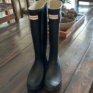 Gently used rain boots